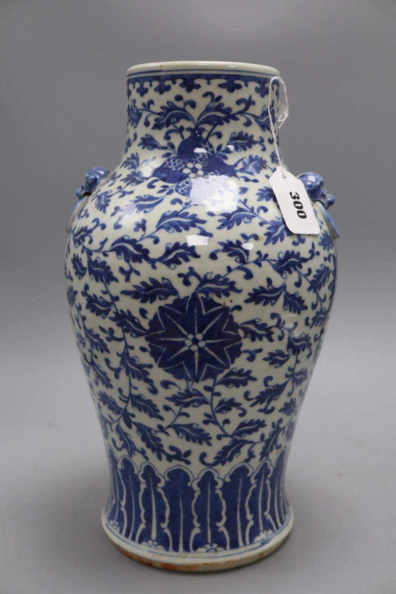 A Chinese blue and white vase, height 39cm (damaged)